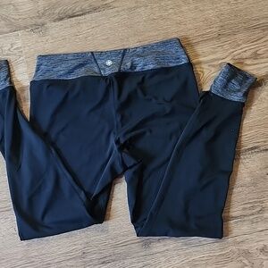 Womens Gaiam yoga pants black with charcoal color and footies XL